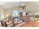 Vaulted ceilings and windows add brightness to this living room with a beautiful skylight at 12 Tidy Island Blvd, Bradenton, FL 34210