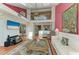 Open living room area features vaulted ceilings with skylights and view of the kitchen at 12 Tidy Island Blvd, Bradenton, FL 34210