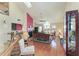 Spacious living room with hardwood floors, vaulted ceilings, and large windows at 12 Tidy Island Blvd, Bradenton, FL 34210