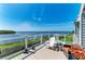 Relaxing patio area offering views of the water and ample seating at 12 Tidy Island Blvd, Bradenton, FL 34210