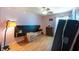 The pink bedroom features hardwood floors, floating nightstands, and modern decor at 12026 Warwick Cir, Parrish, FL 34219