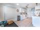 Bright kitchen featuring white cabinets, stainless steel appliances, tile floors, and ample natural light at 12026 Warwick Cir, Parrish, FL 34219