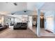 Open-concept living area with seamless flow to kitchen and entryway at 12026 Warwick Cir, Parrish, FL 34219
