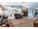 Open living space connecting living room, kitchen, and entryway for easy flow at 12026 Warwick Cir, Parrish, FL 34219
