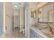Bathroom featuring a decorative glass bowl sink and modern fixtures at 127 Mill E Run, Bradenton, FL 34212