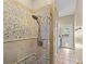 Bathroom boasting a stone-tiled shower and a glass door at 127 Mill E Run, Bradenton, FL 34212
