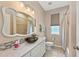Bathroom with decorative sink, vanity, and tile shower at 127 Mill E Run, Bradenton, FL 34212