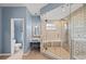 Bathroom features a walk-in shower, vanity area, and separate toilet room at 127 Mill E Run, Bradenton, FL 34212