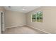 Bright bedroom with natural light, ceiling fan, and hardwood floors at 127 Mill E Run, Bradenton, FL 34212