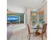 Cozy breakfast nook featuring a glass table and pool views, perfect for enjoying morning sunshine and a quiet meal at 127 Mill E Run, Bradenton, FL 34212