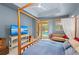 Comfortable main bedroom with ceiling fan and sliding doors to the pool area at 127 Mill E Run, Bradenton, FL 34212