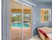 View from the main bedroom overlooking the beautiful pool and patio area at 127 Mill E Run, Bradenton, FL 34212