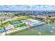Aerial view of the neighborhood amenities with water views and manicured landscaping at 130 Riviera Dunes Way # 502, Palmetto, FL 34221