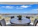 Balcony with stunning water view, features a table and chairs at 130 Riviera Dunes Way # 502, Palmetto, FL 34221
