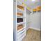 Spacious walk-in closet with custom shelving and ample storage, perfect for organizing clothes and accessories at 130 Riviera Dunes Way # 502, Palmetto, FL 34221