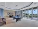 Spacious game room featuring a pool table and large windows with an outdoor view at 130 Riviera Dunes Way # 502, Palmetto, FL 34221