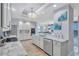 Spacious kitchen with granite counters, stainless appliances, and an open layout at 130 Riviera Dunes Way # 502, Palmetto, FL 34221