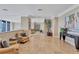 Inviting lobby area with stylish furnishings, decor, and travertine flooring at 130 Riviera Dunes Way # 502, Palmetto, FL 34221