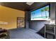 Home theater room with a large screen for viewing movies at 130 Riviera Dunes Way # 502, Palmetto, FL 34221