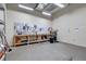 Well-lit workshop area with a workbench and tool storage at 130 Riviera Dunes Way # 502, Palmetto, FL 34221