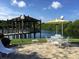 Picturesque community area with a gazebo overlooking the water, perfect for relaxing or socializing at 1414 58Th W St # 1414, Bradenton, FL 34209