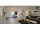 Open-concept living area with contemporary furnishings and decor, enhancing the home's inviting ambiance at 1414 58Th W St # 1414, Bradenton, FL 34209