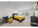 Cozy bedroom with a comfortable bed, side tables, and ample natural light from the windows at 15051 Ginetti St, Nokomis, FL 34275