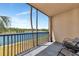 Relax on this large balcony overlooking a serene lake and scenic trees at 16804 Vardon Ter # 205, Bradenton, FL 34211
