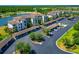 Gorgeous waterfront condo featuring covered parking, lush landscaping, and beautiful golf course views at 16804 Vardon Ter # 205, Bradenton, FL 34211