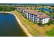 Stunning waterfront condo complex featuring lush landscaping, screened patios and views of the golf course at 16804 Vardon Ter # 205, Bradenton, FL 34211
