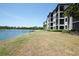 This condo's scenic view is enhanced by a lake and golf course just beyond the lush lawn at 16804 Vardon Ter # 205, Bradenton, FL 34211