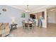 Living room and dining area offer an open concept, perfect for modern living at 16804 Vardon Ter # 205, Bradenton, FL 34211