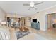 Inviting living room featuring neutral tones, tile flooring, and an open floor plan at 16804 Vardon Ter # 205, Bradenton, FL 34211
