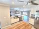 Modern kitchen featuring stainless steel appliances, a deep sink, and tile flooring at 2204 34Th W St, Bradenton, FL 34205