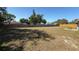 Large, fenced backyard, perfect for outdoor activities and relaxation on a sunny day at 2231 Lockwood Meadows Way, Sarasota, FL 34234