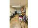 Functional garage featuring ample storage and durable tile flooring, perfect for organization and various hobbies at 2231 Lockwood Meadows Way, Sarasota, FL 34234