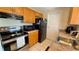 This kitchen features stainless steel appliances and plenty of cabinet space at 2231 Lockwood Meadows Way, Sarasota, FL 34234