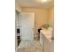 Clean laundry area features a counter for folding, washer/dryer hookups, and storage at 2231 Lockwood Meadows Way, Sarasota, FL 34234