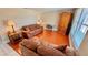 Inviting living room with couches, wood flooring, and plenty of natural light at 2231 Lockwood Meadows Way, Sarasota, FL 34234