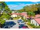 Beautiful aerial view of residences with lush greenery and ample parking at 2259 Pueblo Ln # V38, Sarasota, FL 34231