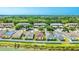 Aerial view of single Gathering home with fenced in yard, in neighborhood at 2344 28Th E Ave, Palmetto, FL 34221