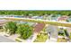 An aerial view of a charming single-Gathering home with a two-car garage, neutral paint and manicured lawn at 2344 28Th E Ave, Palmetto, FL 34221