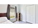 Cozy bedroom featuring wood-look floors, neutral walls, and natural light at 2344 28Th E Ave, Palmetto, FL 34221