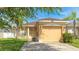 Charming single-story home with a well-maintained lawn and attached two-car garage at 2344 28Th E Ave, Palmetto, FL 34221