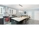 Spacious kitchen featuring a large island, stainless steel appliances, and pendant lighting at 2344 28Th E Ave, Palmetto, FL 34221
