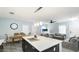 Modern kitchen island, and view of an open dining room and living space at 2344 28Th E Ave, Palmetto, FL 34221