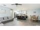 Open concept living room adjacent to the kitchen and dining area at 2344 28Th E Ave, Palmetto, FL 34221