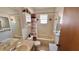 Functional bathroom featuring a tub and shower combination, vanity, and tiled walls at 2448 45Th S St, St Petersburg, FL 33711