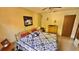 Comfortable bedroom with queen bed, matching dressers and ceiling fan at 2448 45Th S St, St Petersburg, FL 33711