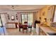 Dining room space featuring tile flooring, dining room set, and large sliding glass doors at 2448 45Th S St, St Petersburg, FL 33711
